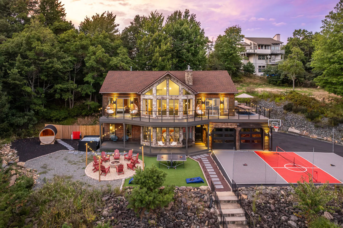 2114-Strawberry-Landing-Long-Pond-PA-18334-additional-airbnb-009-aerial-twilight.webp