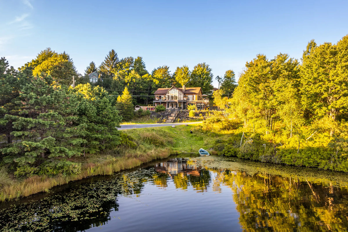 2114-Strawberry-Landing-Long-Pond-PA-18334-additional-airbnb-022-aerial-golden-hour.webp