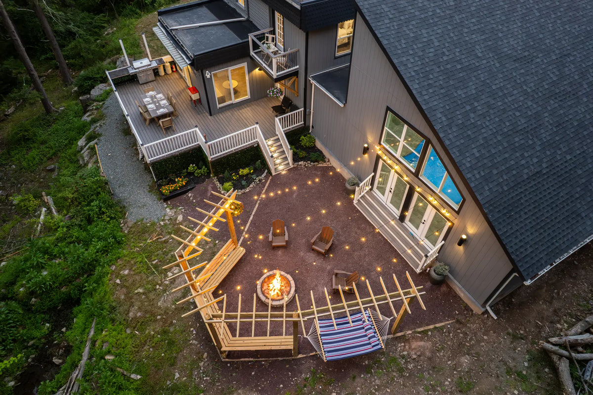 1359-Peterson-Rd-Cresco-18326-airbnb-004-twilight-aerial.webp