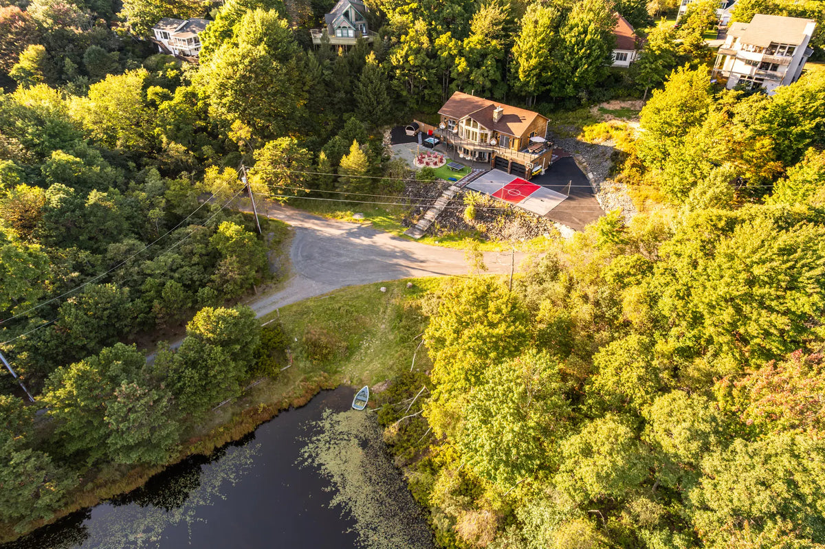2114-Strawberry-Landing-Long-Pond-PA-18334-additional-airbnb-023-aerial-golden-hour.webp