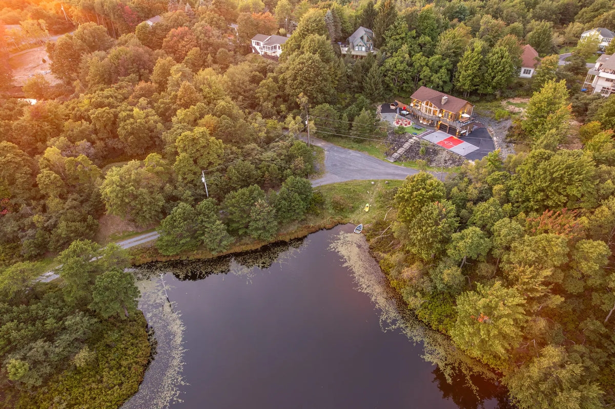 2114-Strawberry-Landing-Long-Pond-PA-18334-additional-airbnb-021-aerial-golden-hour.webp