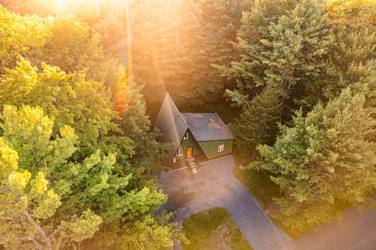 4113-Low-Ridge-Rd-Pocono-Summit-PA-18346-airbnb-006-aerial-golden-hour.webp