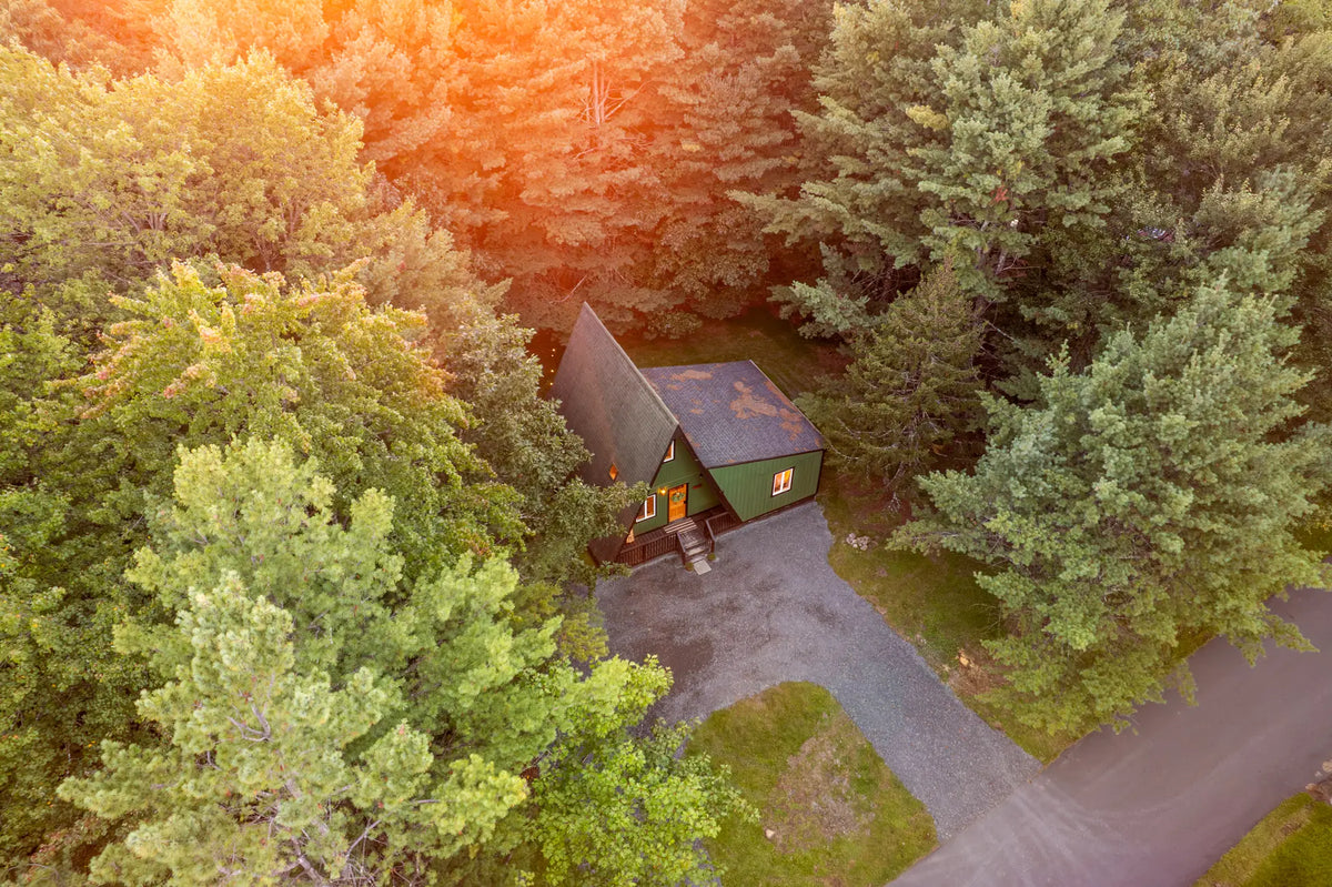 4113-Low-Ridge-Rd-Pocono-Summit-PA-18346-airbnb-007-aerial-golden-hour.webp