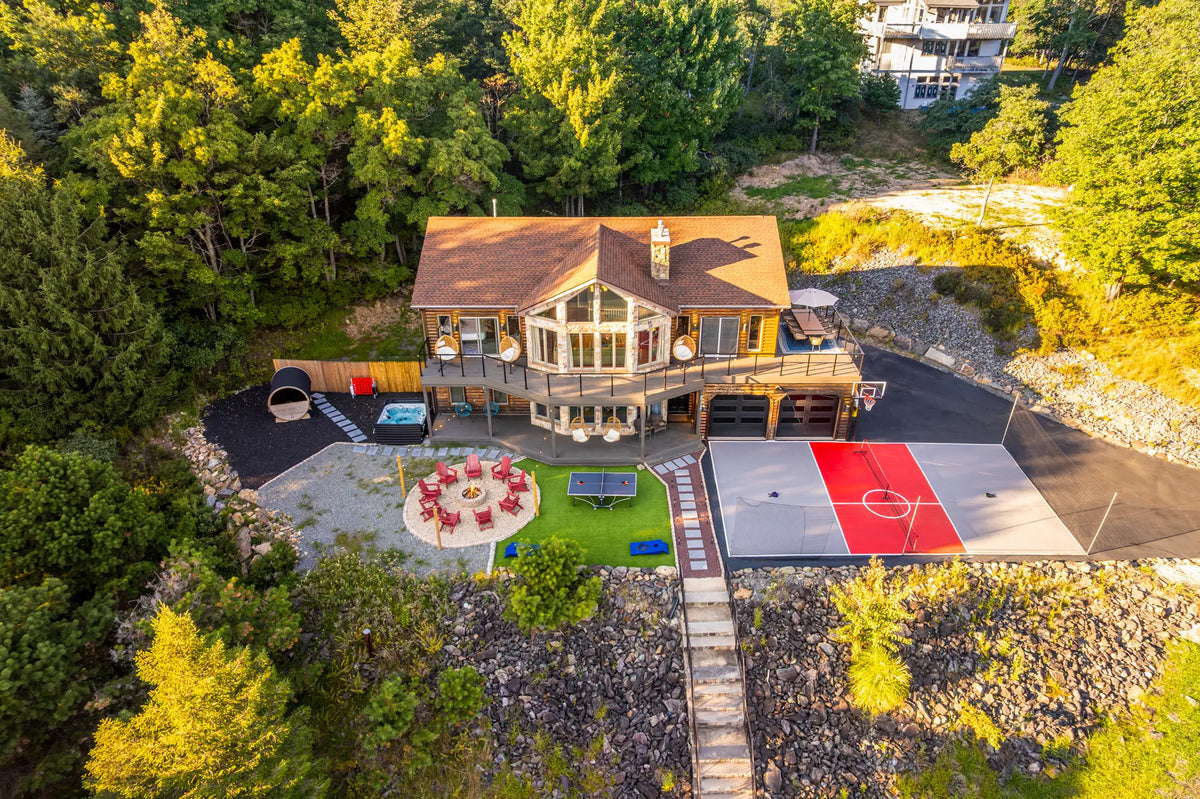 2114-Strawberry-Landing-Long-Pond-PA-18334-additional-airbnb-020-aerial-golden-hour.webp