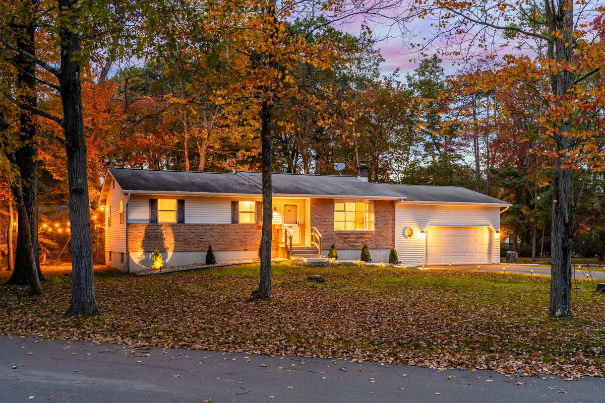 5200-Holiday-Dr-Pocono-Summit-PA-18346-Harmony-House-airbnb-001-twilight.webp