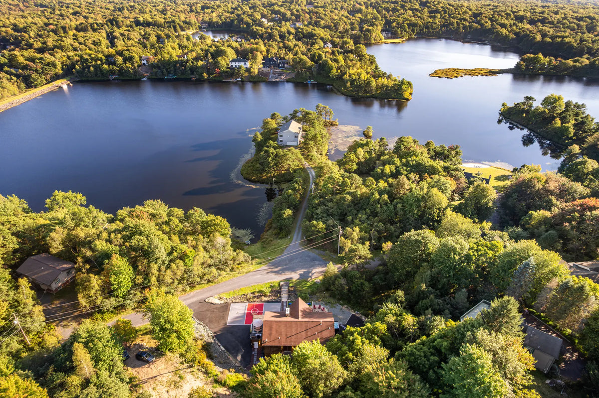 2114-Strawberry-Landing-Long-Pond-PA-18334-additional-airbnb-024-aerial-golden-hour.webp