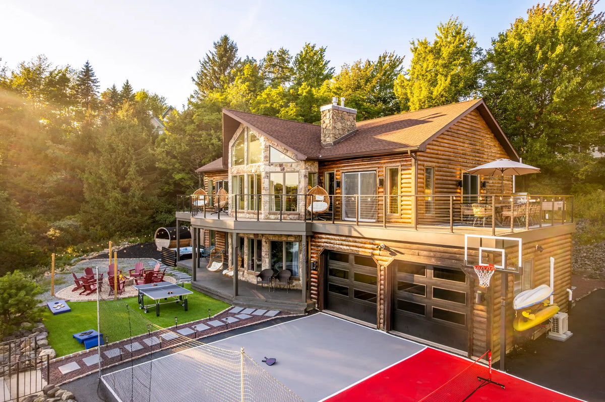 2114-Strawberry-Landing-Long-Pond-PA-18334-additional-airbnb-019-aerial-golden-hour.webp