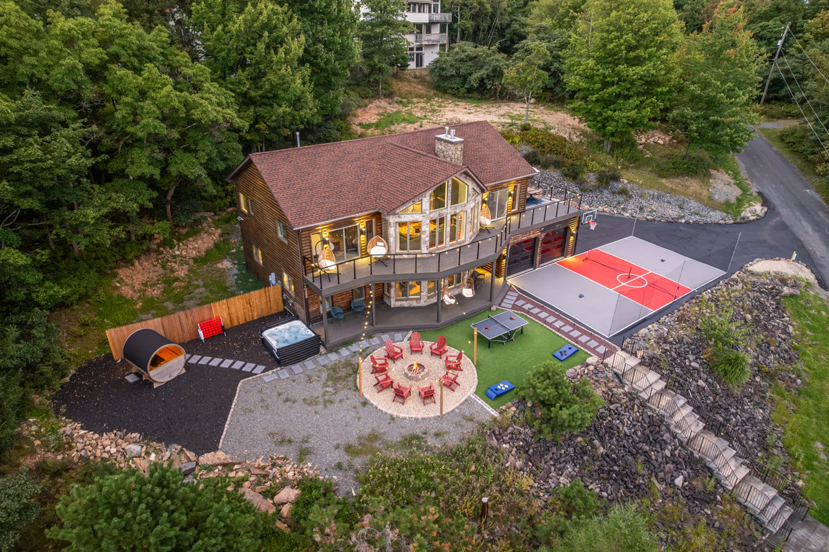 2114-Strawberry-Landing-Long-Pond-PA-18334-additional-airbnb-012-aerial-twilight.webp