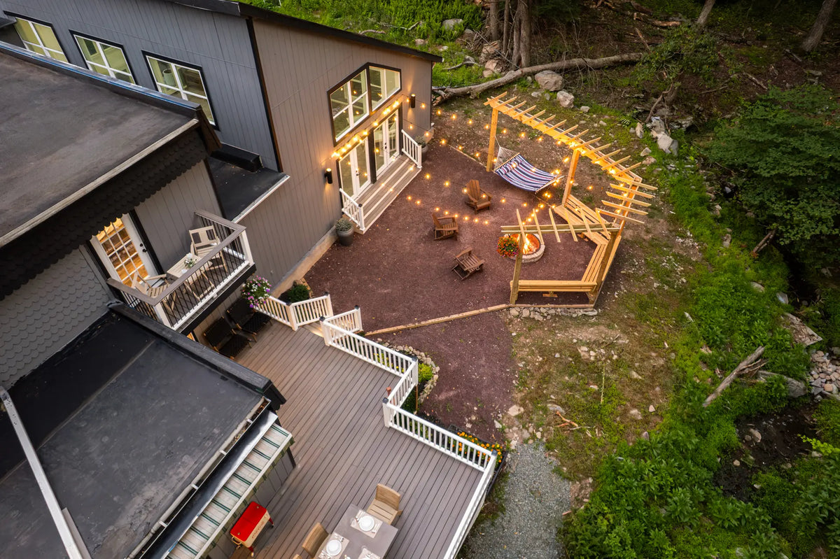 1359-Peterson-Rd-Cresco-18326-airbnb-003-twilight-aerial.webp