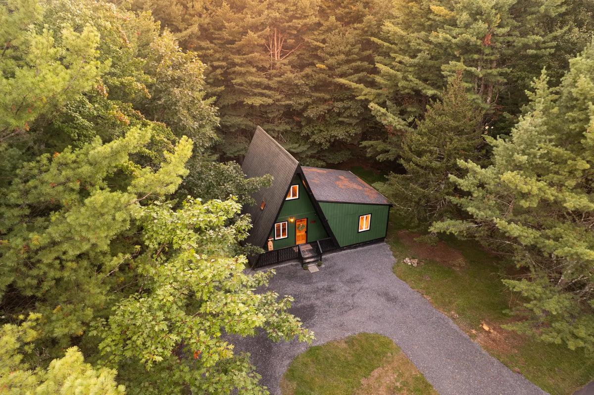 4113-Low-Ridge-Rd-Pocono-Summit-PA-18346-airbnb-009-aerial-golden-hour.webp